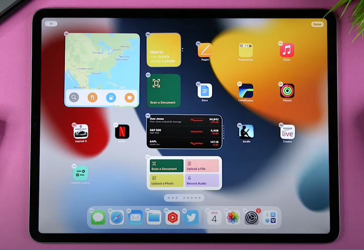 Put the iPad into jiggle mode and help download the widget